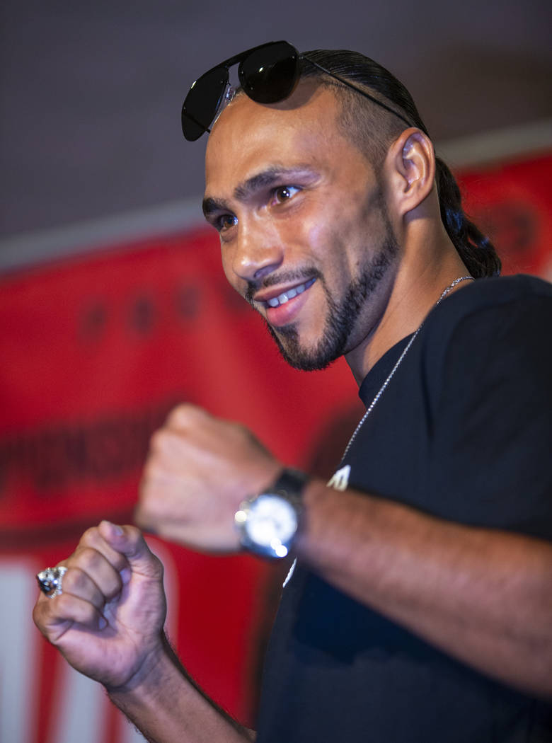 Boxer Keith Thurman poses during his grand arrival to the MGM Grand, Tuesday, July 16, 2019, in ...