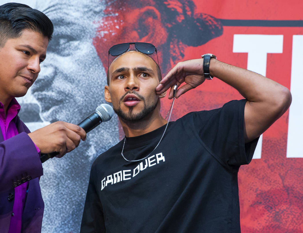 Emcee Ray Flores, left, interviews Boxer Keith Thurman during his grand arrival to the MGM Gran ...