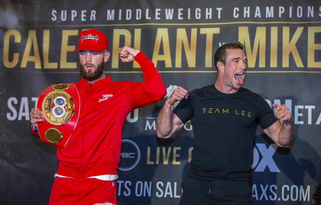 Boxers Caleb Plant, left, and Mike Lee pose for the fans during fighter grand arrivals at the M ...