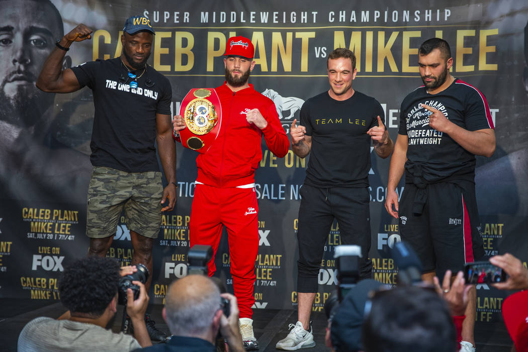 Boxers Efe Ajaba, from left, Caleb Plant, Mike Lee and Eren Demirezen pose for the fans on the ...