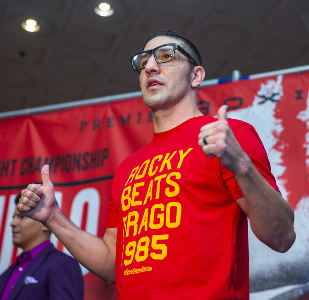 Boxer John Molina Jr. gives a thumbs up to the crowd during fighter grand arrivals at the MGM G ...