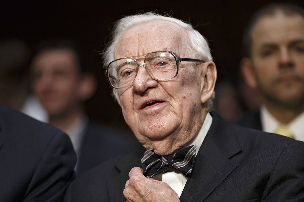 Retired Supreme Court Justice John Paul Stevens prepares to testify on the ever-increasing amou ...