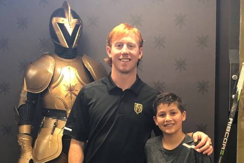 13-year-old Doron Coldwell with Golden Knights center Cody Eakin during his time with the team ...