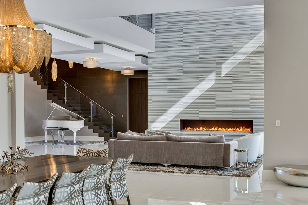 A focal point of the living area is the modern fireplace. (Ivan Sher Group)