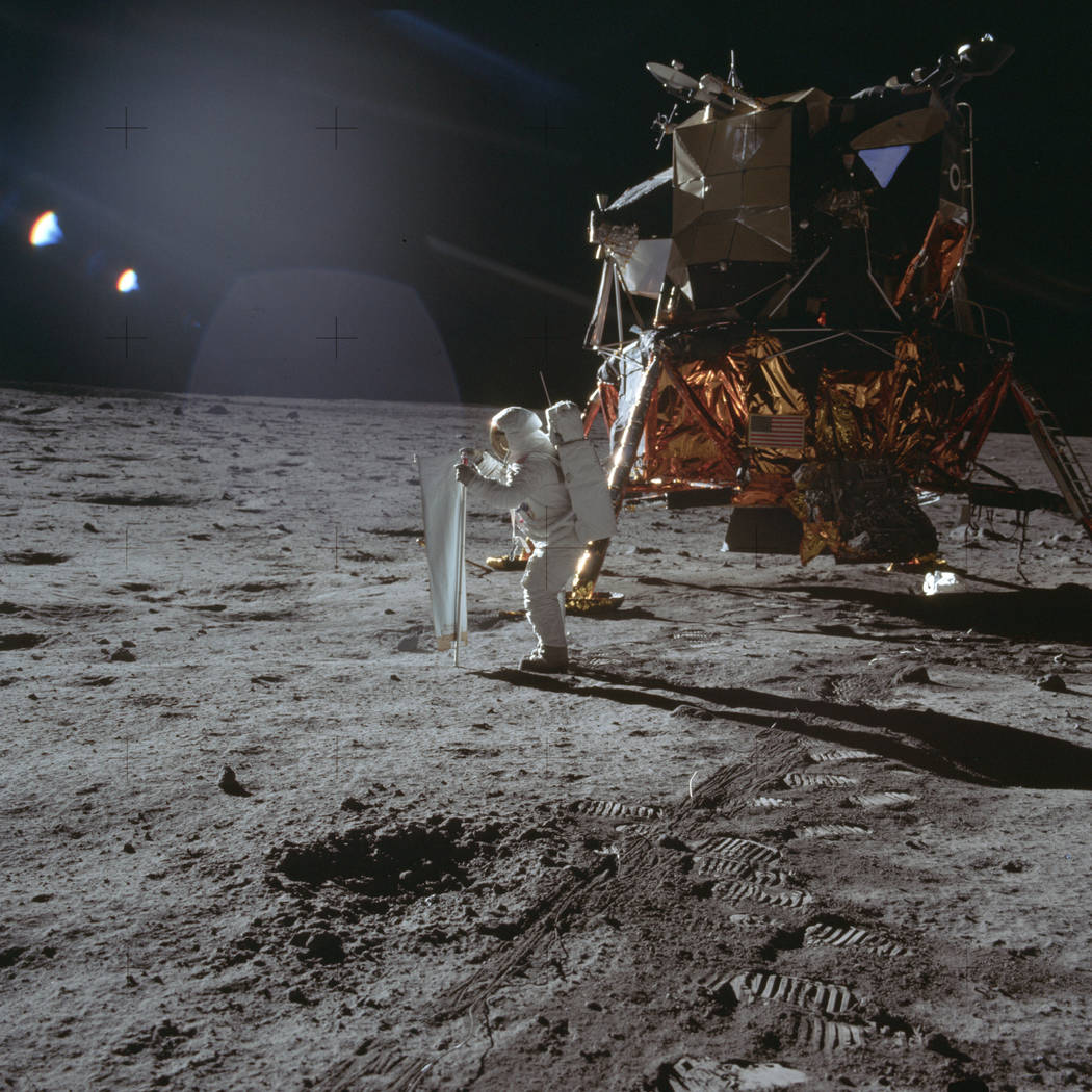 In this July 20, 1969 photo made available by NASA, Apollo 11 astronaut Buzz Aldrin works on a ...