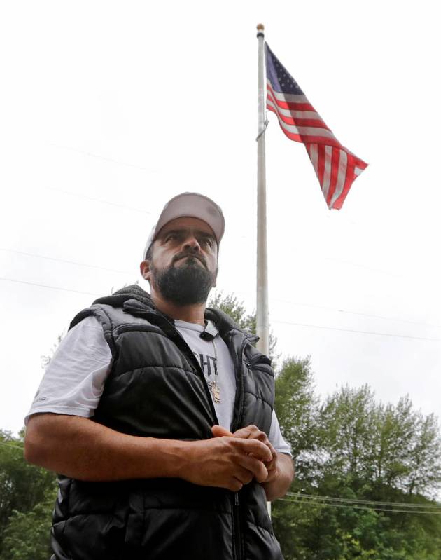 Jose Robles walks into a U.S. Immigration and Customs Enforcement office Wednesday, July 17, 20 ...