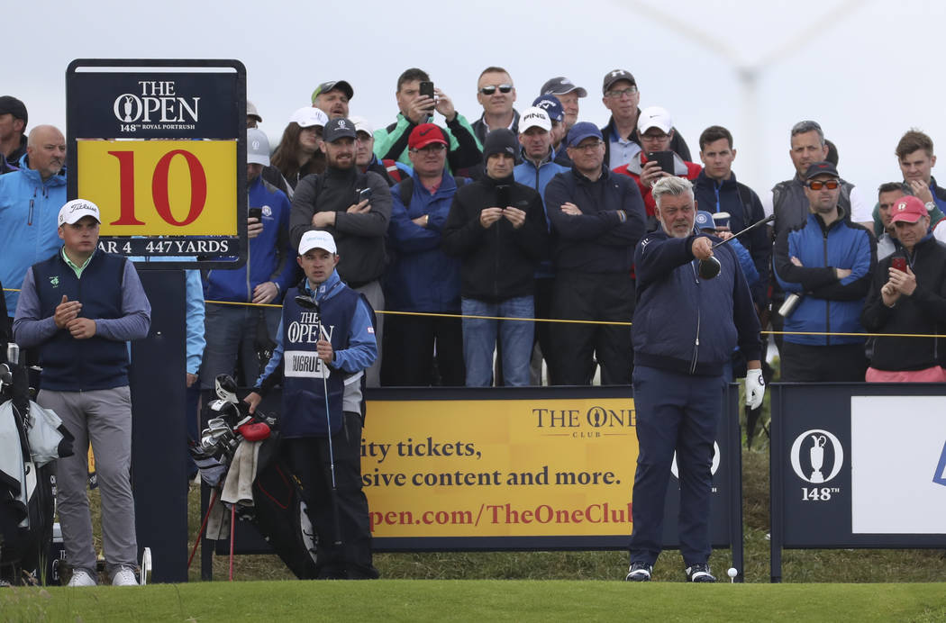 Northern Ireland's Darren Clarke points with this club as he stand on the 10th tee during the f ...