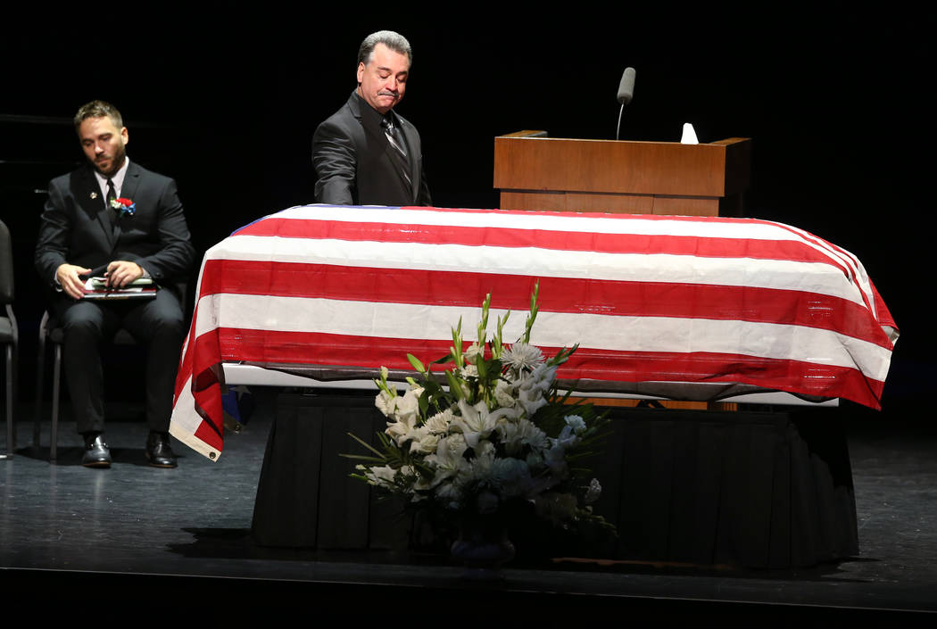 Friend Dennis Flynn after speaking during funeral services for former Metropolitan Police Depar ...