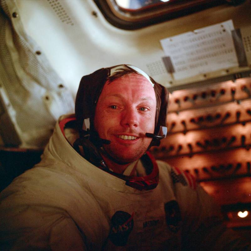 Astronaut Neil Armstrong, Apollo 11 commander, sits inside the Lunar Module after he and Buzz A ...