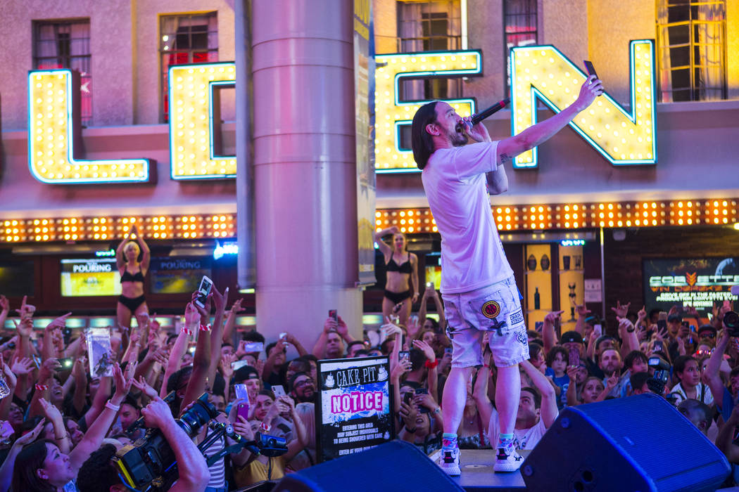 Steve Aoki performs on the Main Street Stage at the Fremont Street Experience after the debut o ...