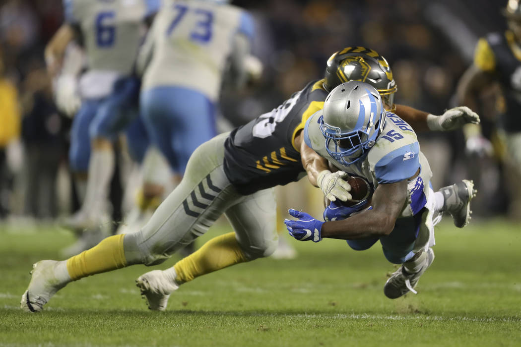 Salt Lake Stallions' De’Mornay Pierson-El (15) dives for extra yardage past San Diego Fleet l ...