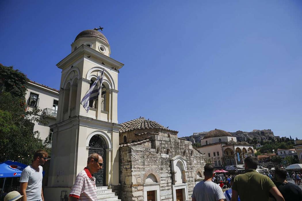 The bell tower of Pantanassa church at the Monastiraki square is damaged following an earthquak ...