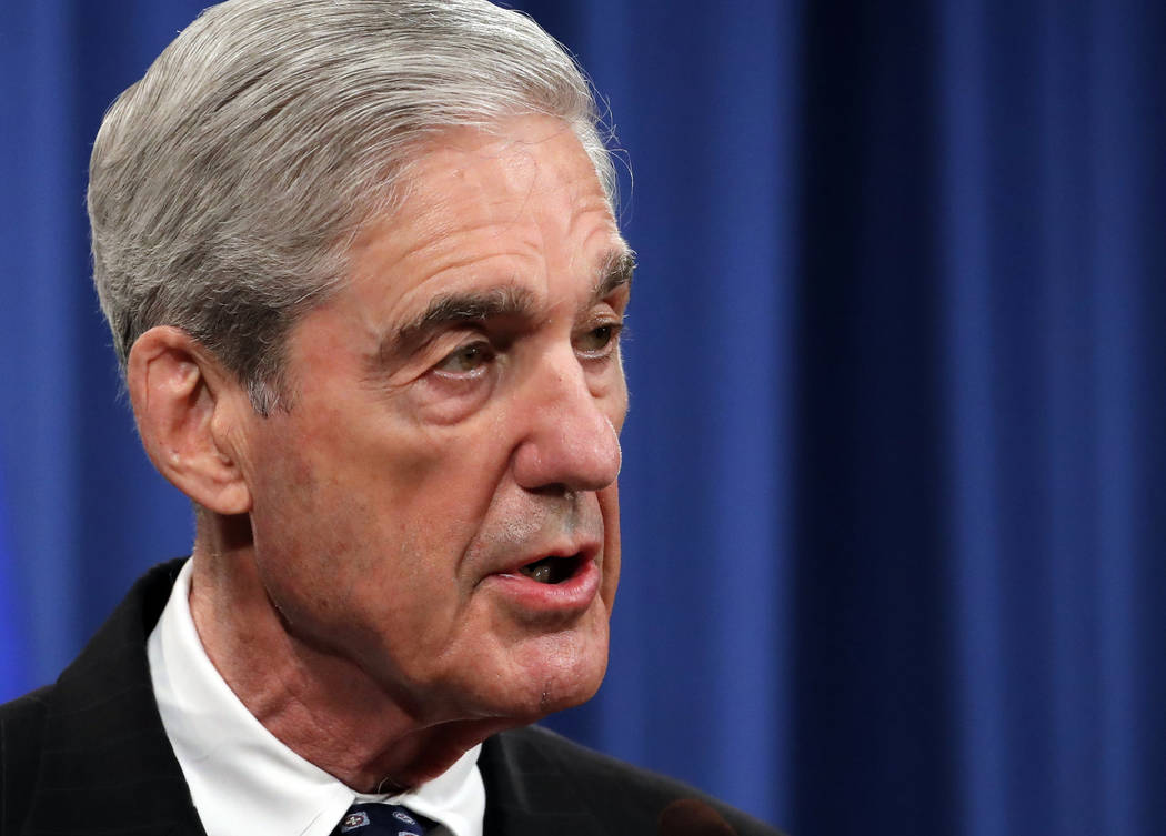 FILE - In this May 29, 2019, file photo, Special counsel Robert Mueller speaks at the Departmen ...