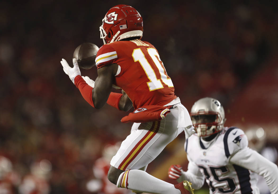 Kansas City Chiefs wide receiver Tyreek Hill (10) makes a catch during the first half of the AF ...