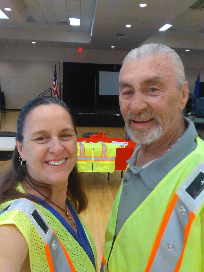Megan Collins and Tom Mueller, founders of Solar LED Safety Products, are pictured wearing a sa ...
