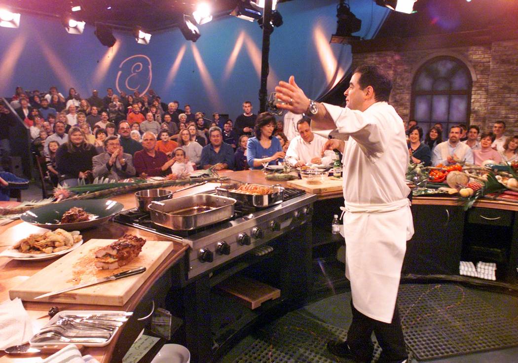 Chef Emeril Lagasse acknowledges the audience during a taping of one of his programs for the Fo ...