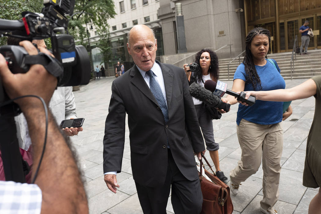 Martin Weinberg, a defense attorney for Jeffrey Epstein, leaves federal court in New York after ...