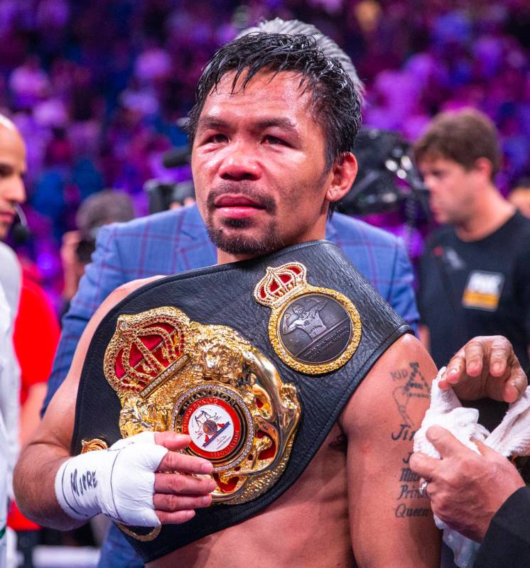 Manny Pacquiao with his belt after defeating Keith Thurman in their WBA super welterweight worl ...