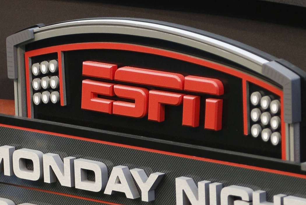 FILE - This Sept. 16, 2013, file photo shows the ESPN logo prior to an NFL football game betwee ...