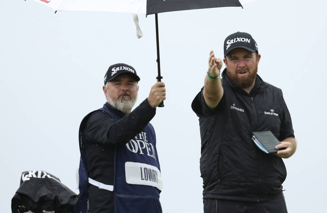 Ireland's Shane Lowry gestures as he looks dome the 6th hole from the tee during the final roun ...