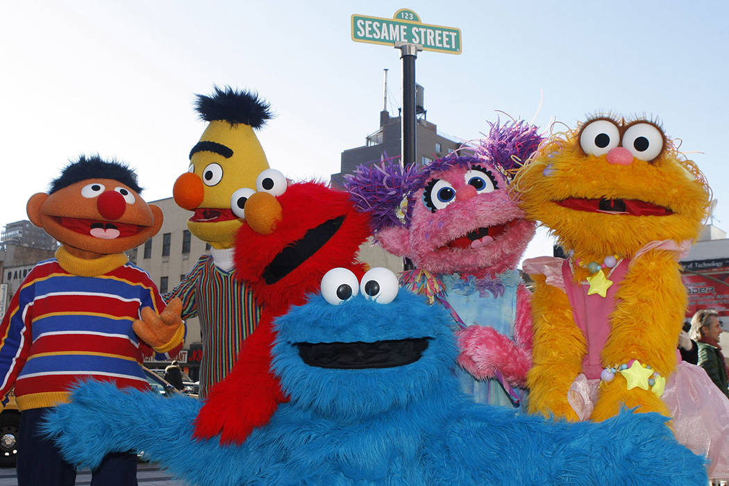 FILE - In this Feb. 10, 2010 file photo, characters from Sesame Street Live appear on the stree ...