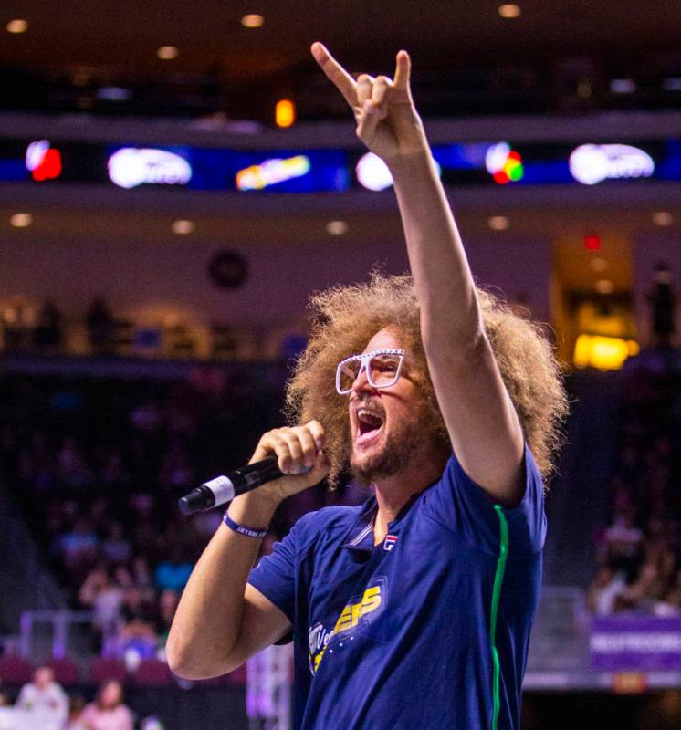 The Vegas Rollers' assistant coach Stefan Redfoo Gordy pumps up the crowd versus the Philadelph ...