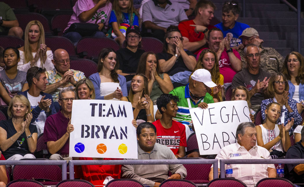 Fans cheer and wave signs for the Vegas Rollers as they take the court for the second home matc ...