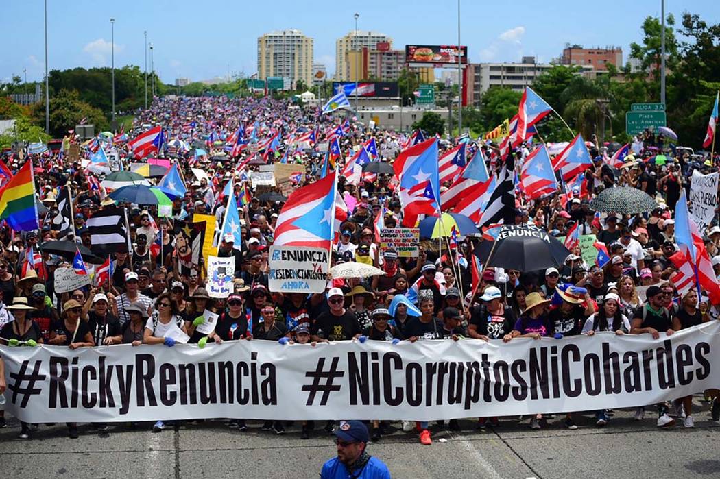 Thousands of Puerto Ricans gather for what many are expecting to be one of the biggest protests ...