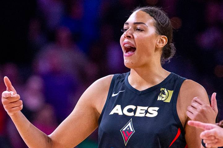 Las Vegas Aces center Liz Cambage (8) pumps up her teammates during the overtime period versus ...