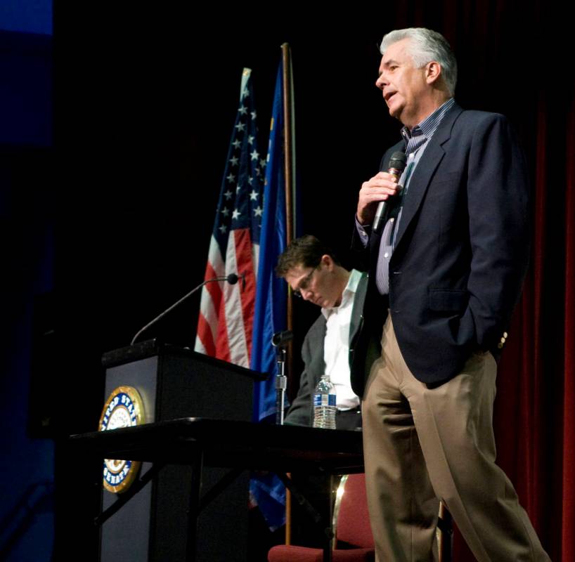 Sen. John Ensign, R-Nev., answers a question about his extra-marital affair during a town hall ...