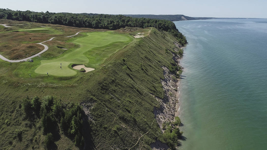 A Friday, July 13, 2019 aerial photo of Arcadia Bluffs Golf Club 12th hole green and fairway ne ...