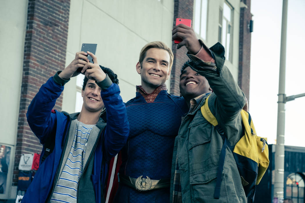 Homelander (Antony Starr) poses for selfies in Amazon Prime's "The Boys."