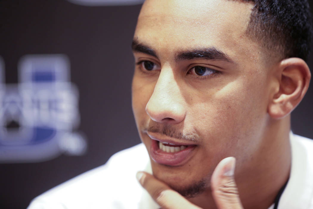 Utah State quarterback Jordan Love talks to reporters during Mountain West football media days ...