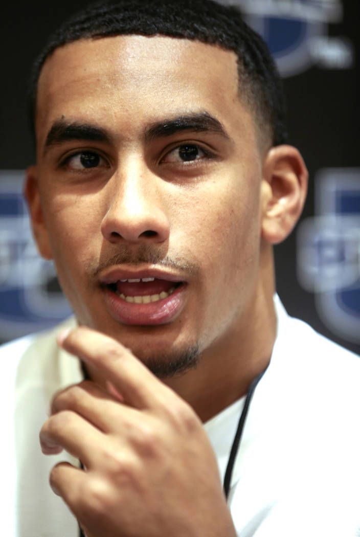 Utah State quarterback Jordan Love talks to reporters during Mountain West football media days ...