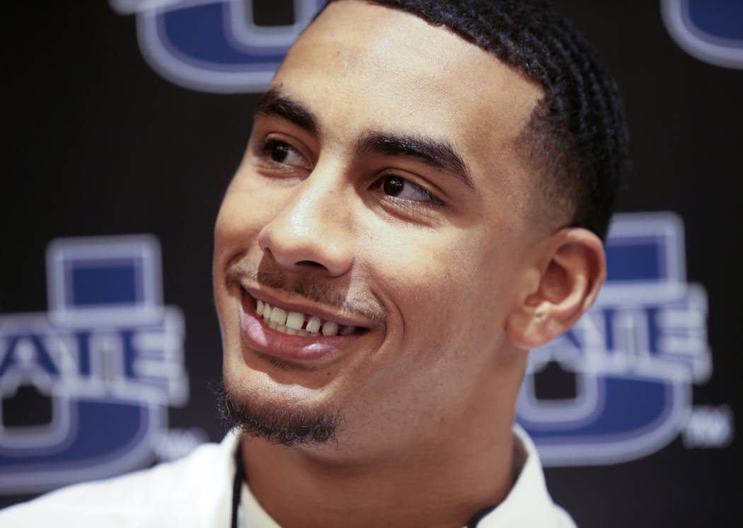 Utah State quarterback Jordan Love talks to reporters during Mountain West football media days ...