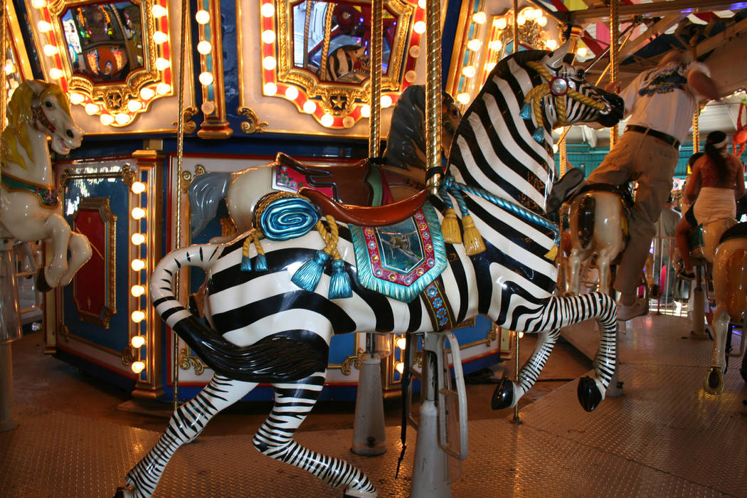 Brightly painted animals, such as this zebra, are a big draw for children who want to ride Shor ...