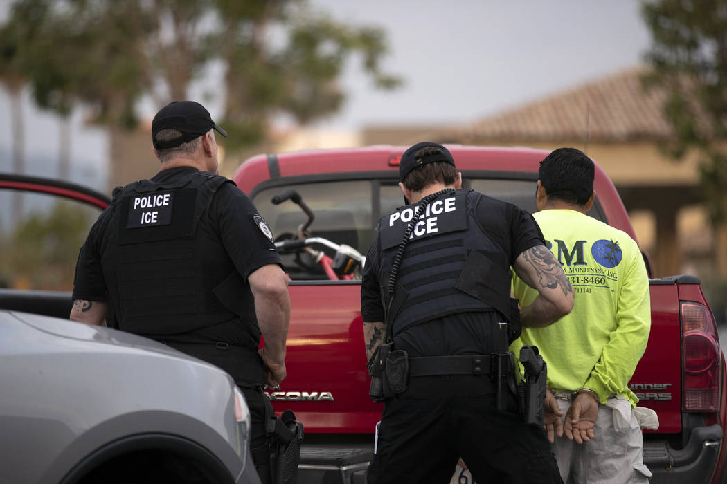 FILE - In this July 8, 2019 file photo, U.S. Immigration and Customs Enforcement (ICE) officers ...