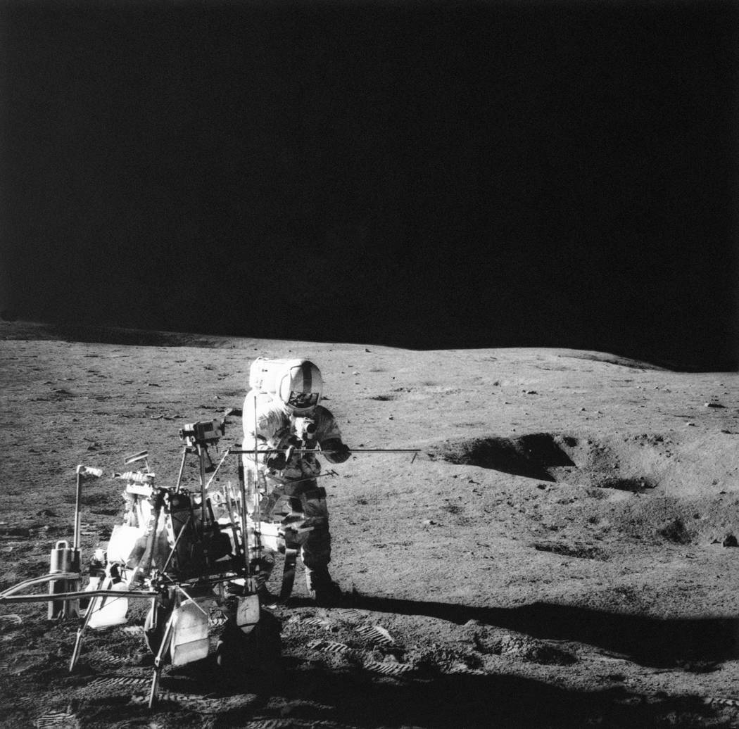 In this Feb. 6, 1971, file photo, Apollo 14 Astronaut Alan B. Shepard Jr., who hit three golf b ...