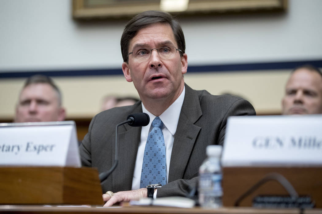 In an April 2, 2019, file photo, Secretary of the Army Mark Esper speaks during a House Armed S ...