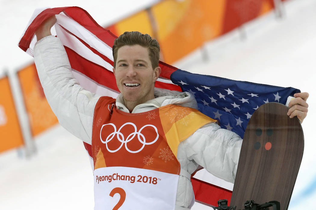 Gold medal winner Shaun White celebrates after the men's halfpipe finals at the 2018 Winter Oly ...