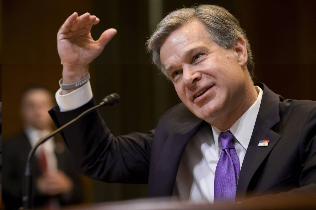 FILE - In this May 7, 2019, file photo, FBI Director Christopher Wray testifies during a hearin ...