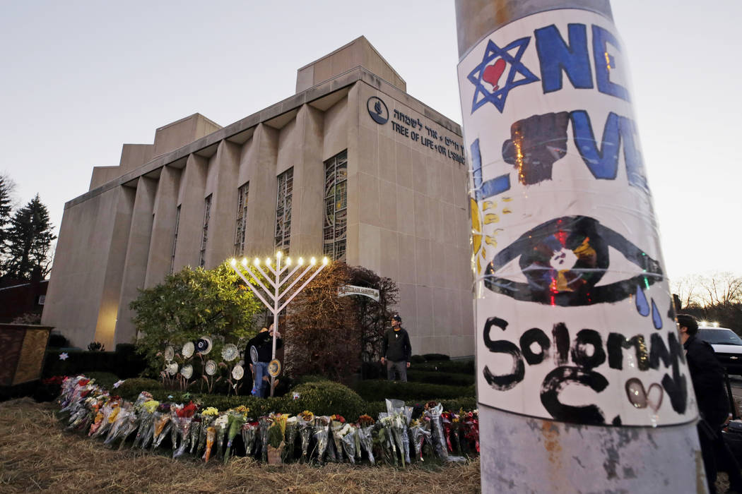 FILE - This Dec. 2, 2018, file photo shows a menorah at a memorial outside the Tree of Life Syn ...