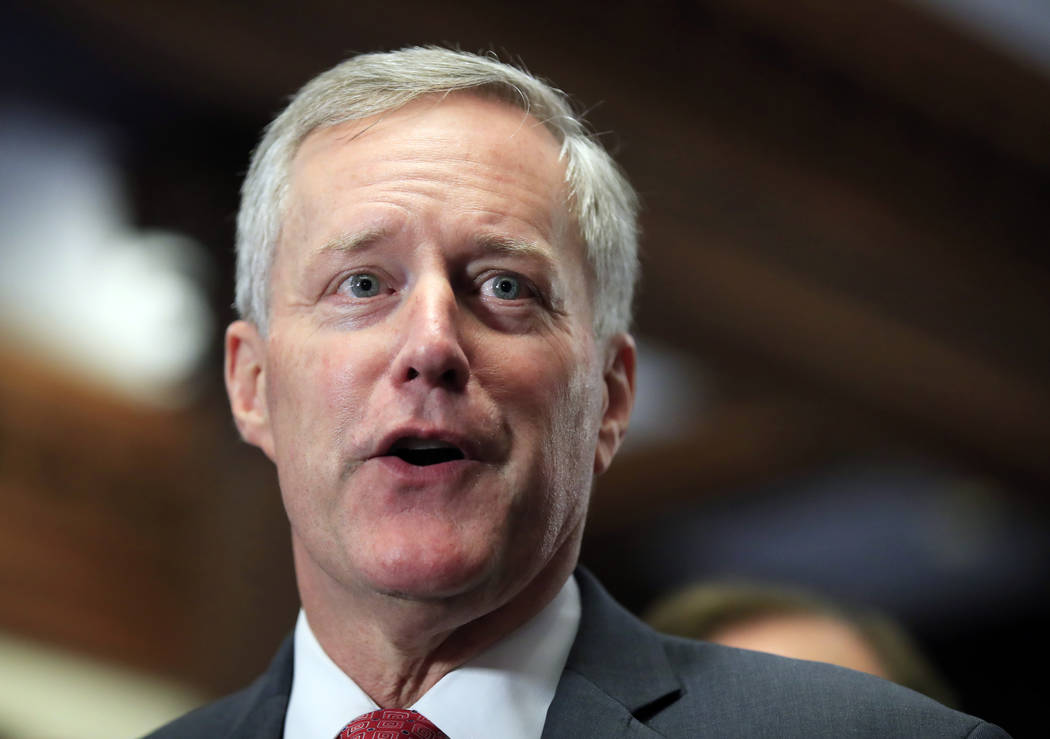 Freedom Caucus Chairman Rep. Mark Meadows, R-S.C., speaks to reporters on Capitol Hill in Washi ...