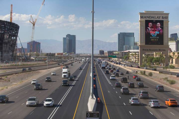 The high occupancy vehicle lanes are largely empty in both directions on Interstate 15 near the ...