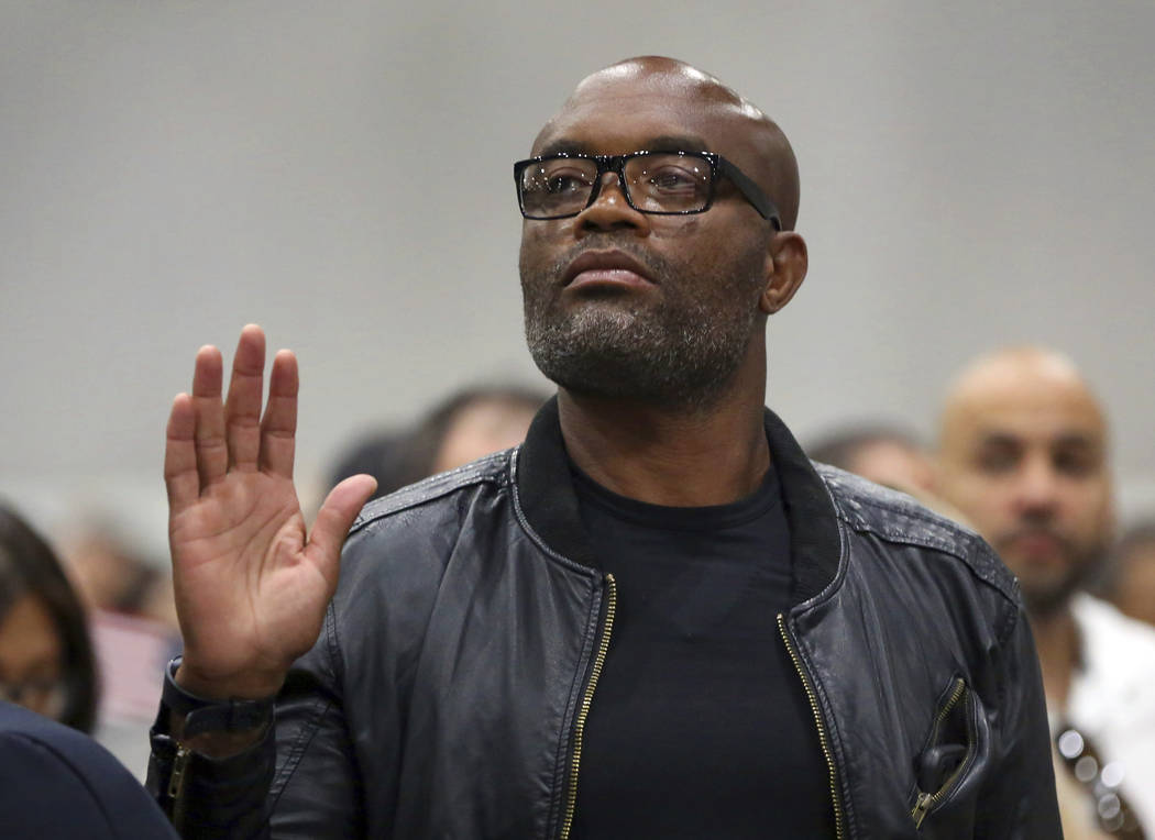 Mixed martial arts great Anderson "Spider" Silva of Brazil is sworn in as a U.S. citi ...