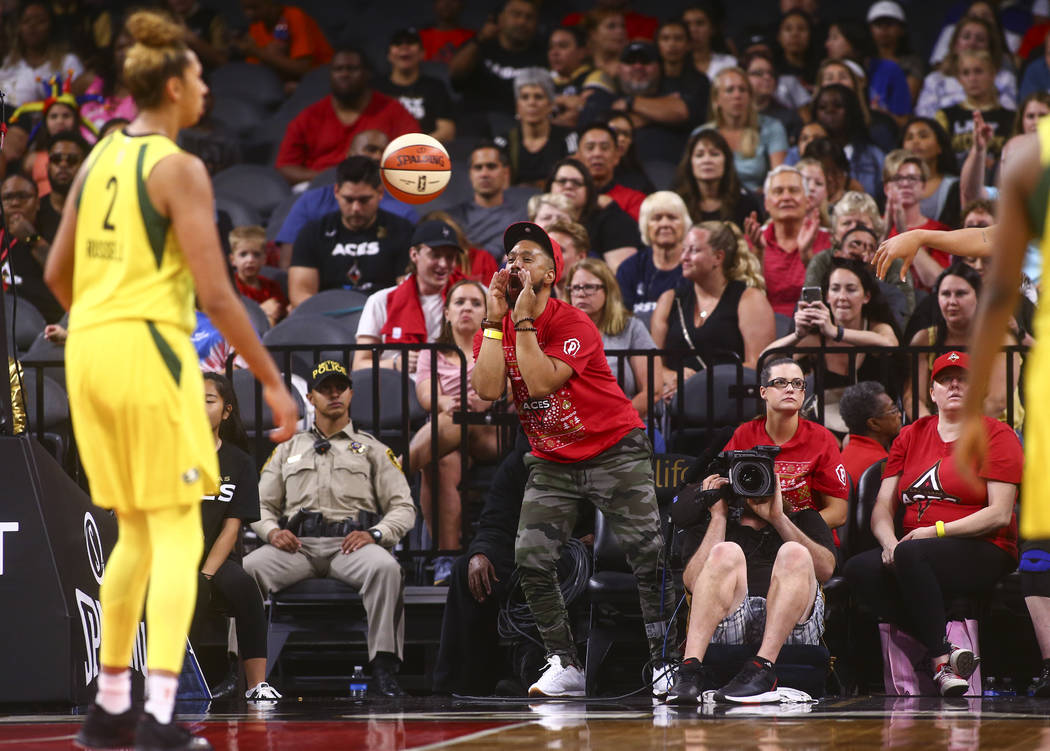A Las Vegas Aces fan reacts during the second half of a WNBA basketball game against Seattle St ...