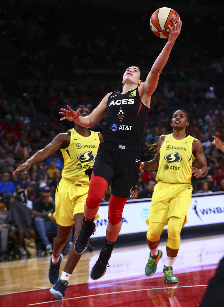 Las Vegas Aces' guard Kelsey Plum (10) goes to the basket against the Seattle Storm during the ...