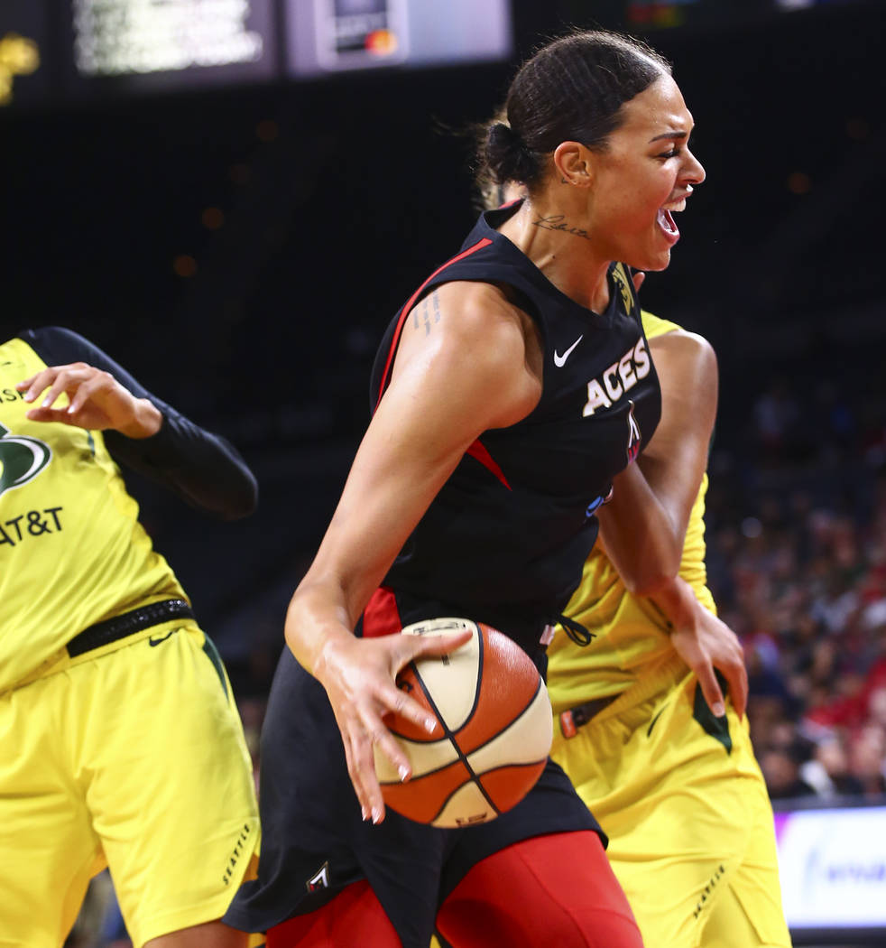 Las Vegas Aces' Liz Cambage drives to the basket against Seattle Storm during the first half of ...