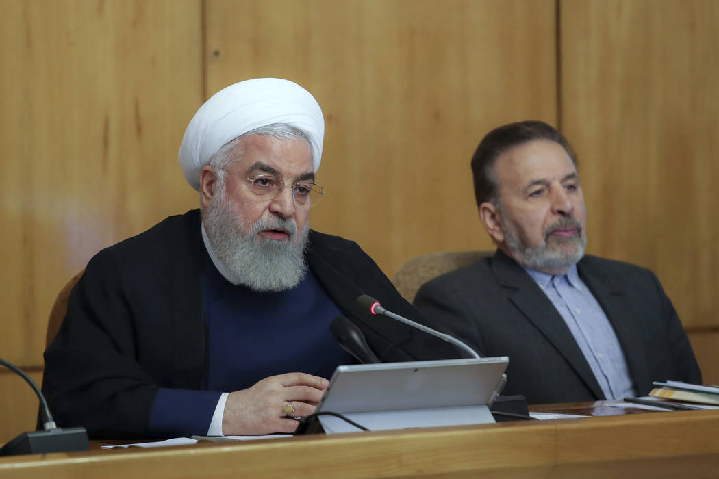 In this photo released by the office of the Iranian Presidency, President Hassan Rouhani speaks ...