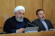 In this photo released by the office of the Iranian Presidency, President Hassan Rouhani speaks ...